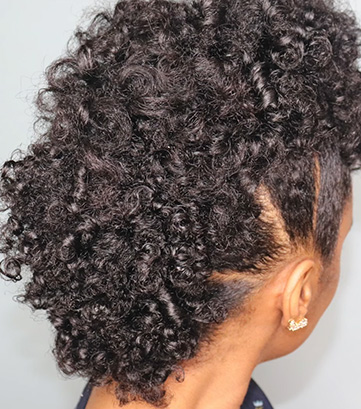 Asymmetrical Curly Mohawk with Highlights