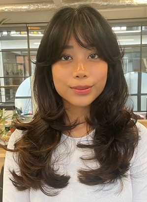 Chic Brunette Layers With Side-Swept Bangs