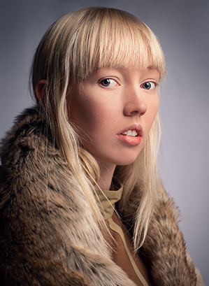 Frosty Blonde Wolf Cut With Bangs