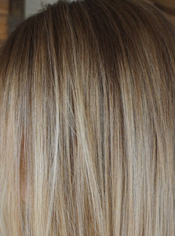 Glamorous Blonde Curls With Dimensional Low Lights