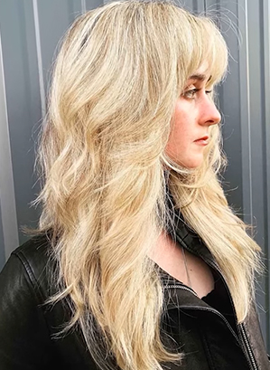 Long Wavy Blonde Wolf Cut With Curtain Bangs