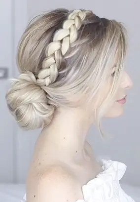Low Bun With Side Pull-Through Braid