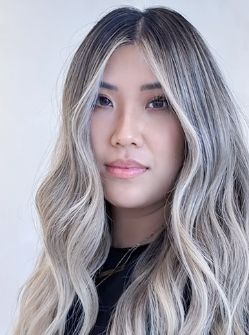 Luxurious Blonde Curls With Dimensional Low Lights