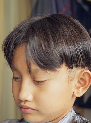 Razor Cut With Curtain Bangs