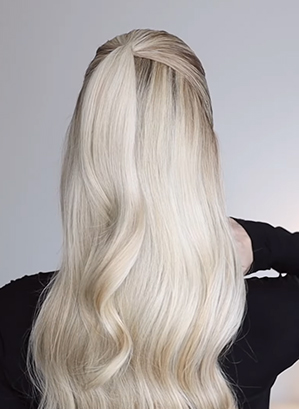 Sleek Slicked-Back Half-Up Waves