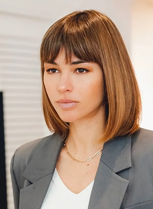 Straight Bob Wolf Cut on Ginger Hair With Blunt Bangs