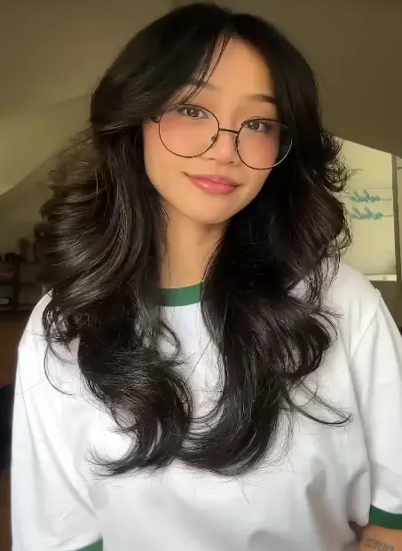 Straight Layered Hair with Curtain Bangs