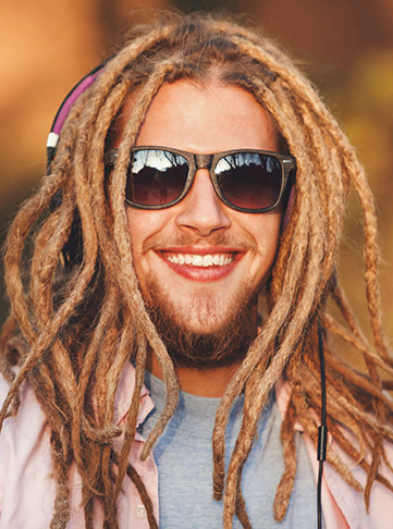  Sun-Kissed Dreadlock Style With Beads