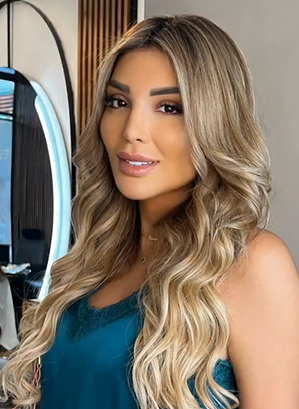 Voluminous Curls With Golden Highlights