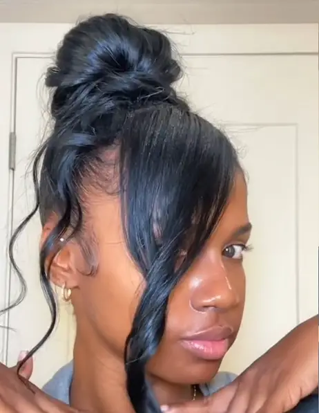 Voluminous Updo Featuring Side Bangs
